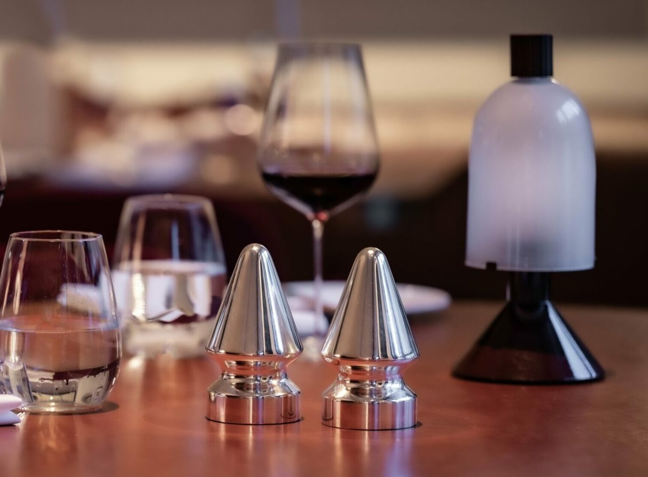 Salt and pepper dispensers designed by Paul McCarthy on a table