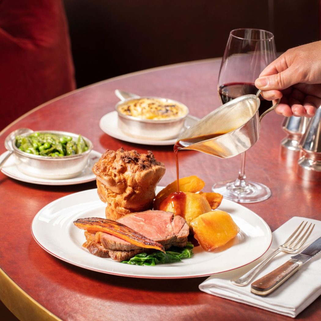Sunday Roast at Mount St. Restaurant with beef, roast potatoes, a Yorkshire pudding and greens