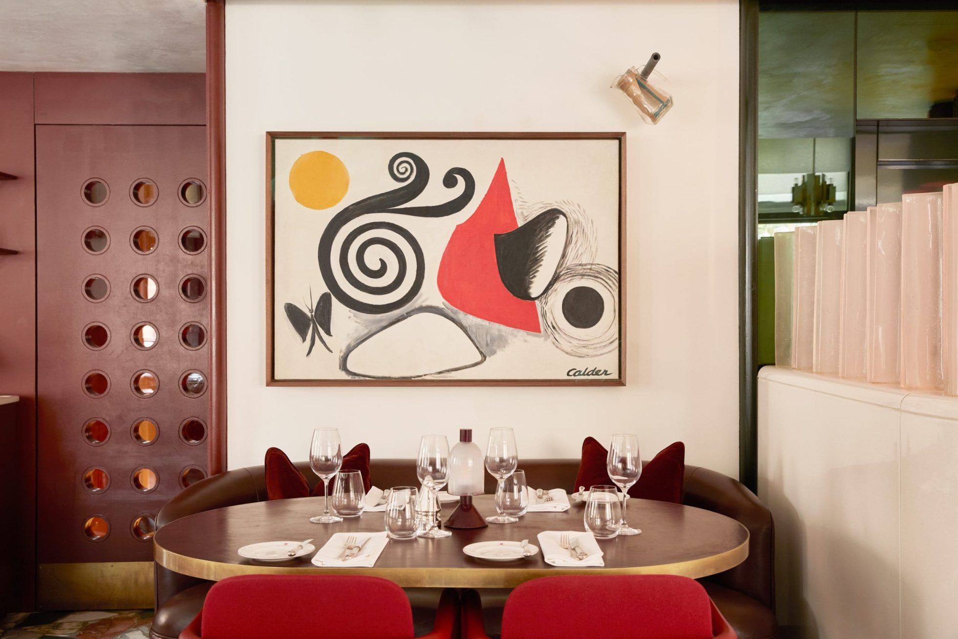 A table in Mount St. Restaurant's with Alexander Calrder's ‘Shapes with Butterfly’ artwork behind