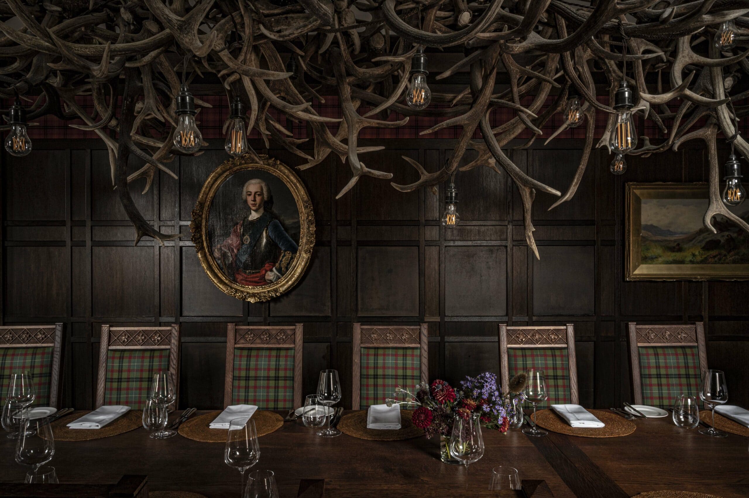 A section of the 9-metre table and tartan upholstered chairs in Scottish oak in The Scottish Room on the third floor