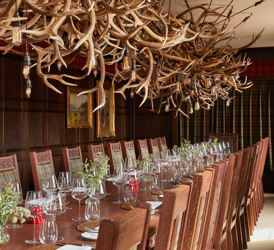 The Scottish Room at Mount St. Restaurant – a large table with deer antlers suspended above