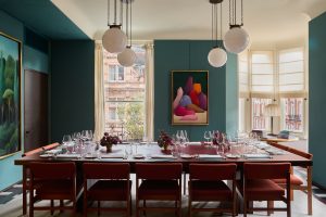 The Swiss Room at Mount St. Restaurant with NICOLAS PARTY's artwork ‘Still Life’ in the background