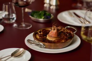 Mount St. Restaurant's lobster pie at the centre of a table